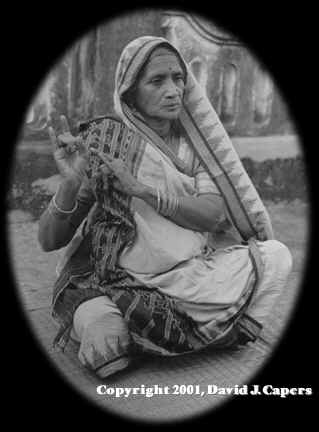 Dungri mahari demonstrating hand gesture language of Orissi dance, 1985.